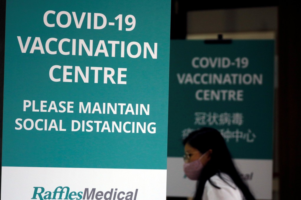 In Singapore, the government offers free jabs from Pfizer-BioNTech and US firm Moderna while residents can pay for Sinovac shots. Photo: Reuters