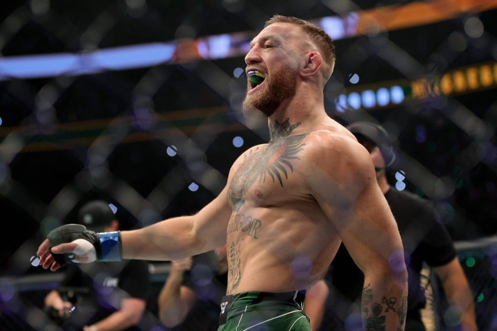 Conor McGregor performs his trademark strut before his lightweight bout against Dustin Poirier at UFC 264. Photo: AFP
