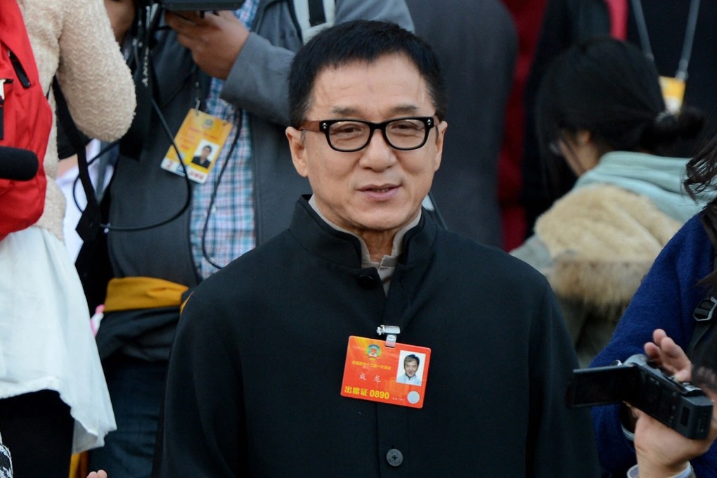 Hong Kong star Jackie Chan leaves the opening session of the Chinese People's Political Consultative Conference at the Great Hall of the People in Beijing in March 2013. Photo: AFP