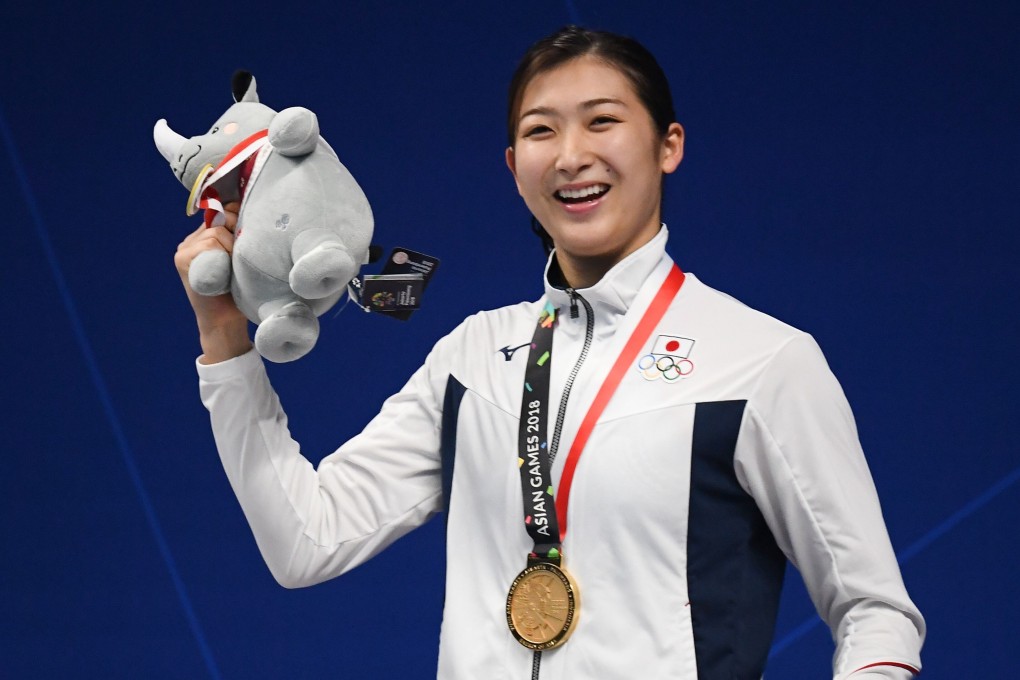 Rikako Ikee on the top podium after winning the women’s 100m freestyle at the 2018 Asian Games in Jakarta. Photo: AFP