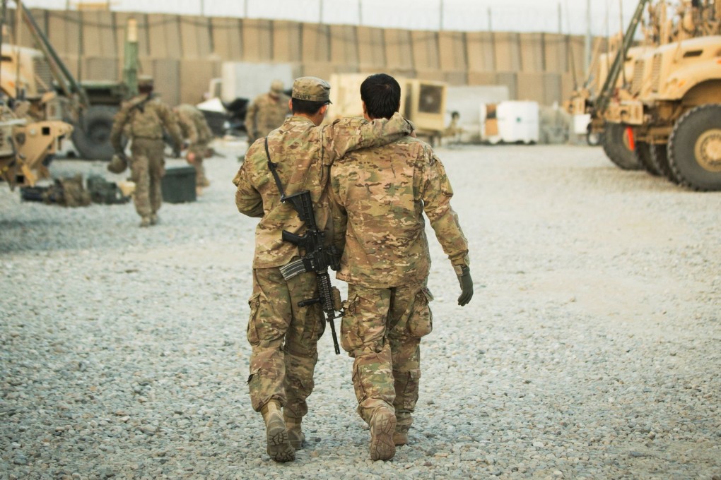 A US soldier and an Afghan interpreter in 2014. File photo: Reuters