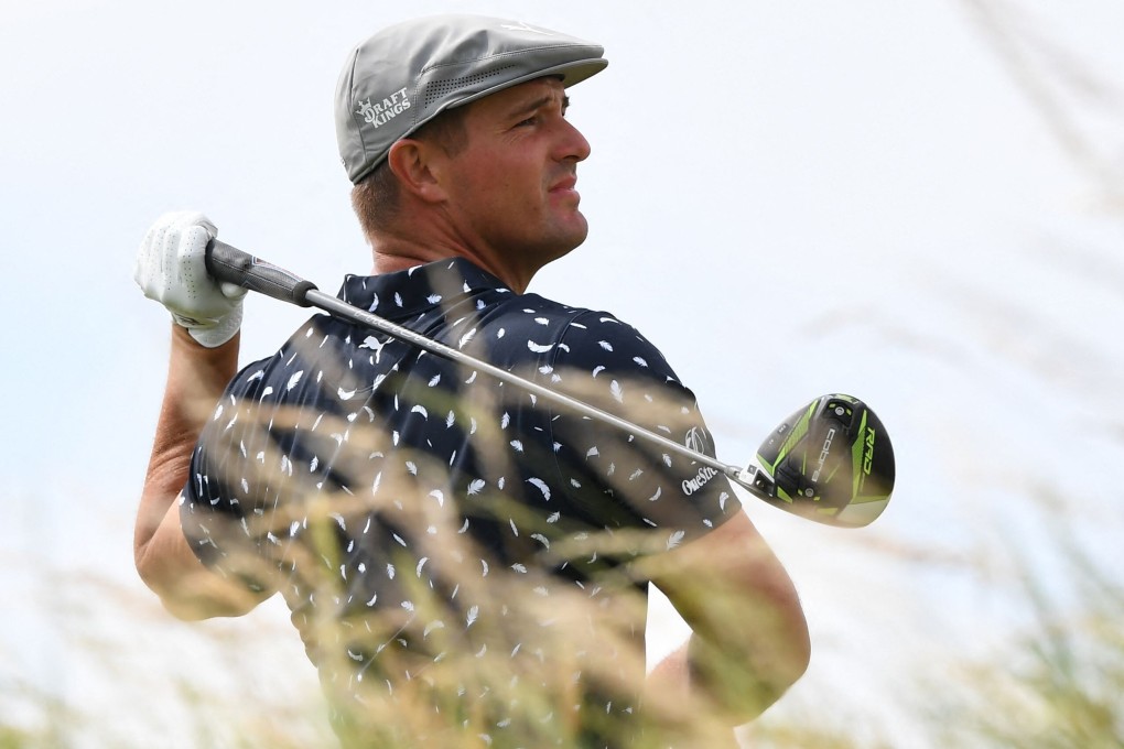 Bryson DeChambeau watches a wayward drive on the ninth tee during his first round at the 149th Open Championship at Royal St George’s in southeast England. Photo: AFP