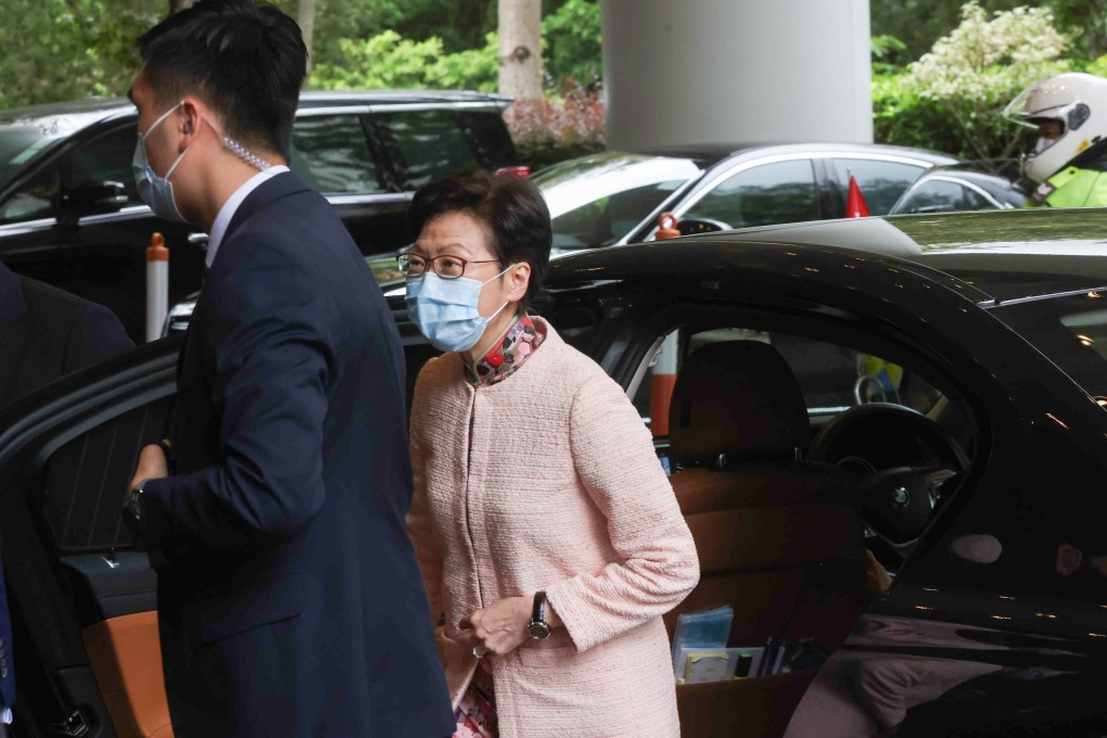 Chief Executive Carrie Lam arrives at the Conrad Hotel for an online forum on Friday focusing on the national security law. Photo: K. Y. Cheng