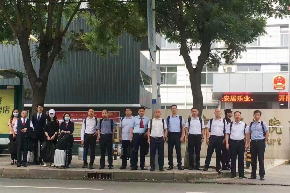 The legal team for billionaire businessman Sun Dawu and his 19 co-defendants outside court in Hebei province. Photo: Handout