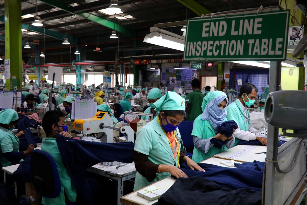 Garment employees work at Fakhruddin Textile Mills Limited in Gazipur, Bangladesh. Smaller-scale suppliers in Bangladesh would be greatly affected by rising water levels. Photo: Reuters