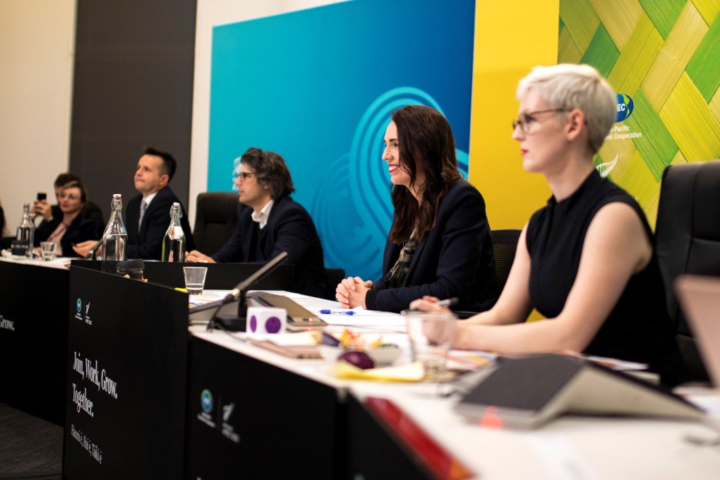New Zealand's Prime Minister Jacinda Ardern (second from right) chairing the Apec 2021 Informal Leaders' Retreat alongside Apec officials in Wellington. Photo: AFP