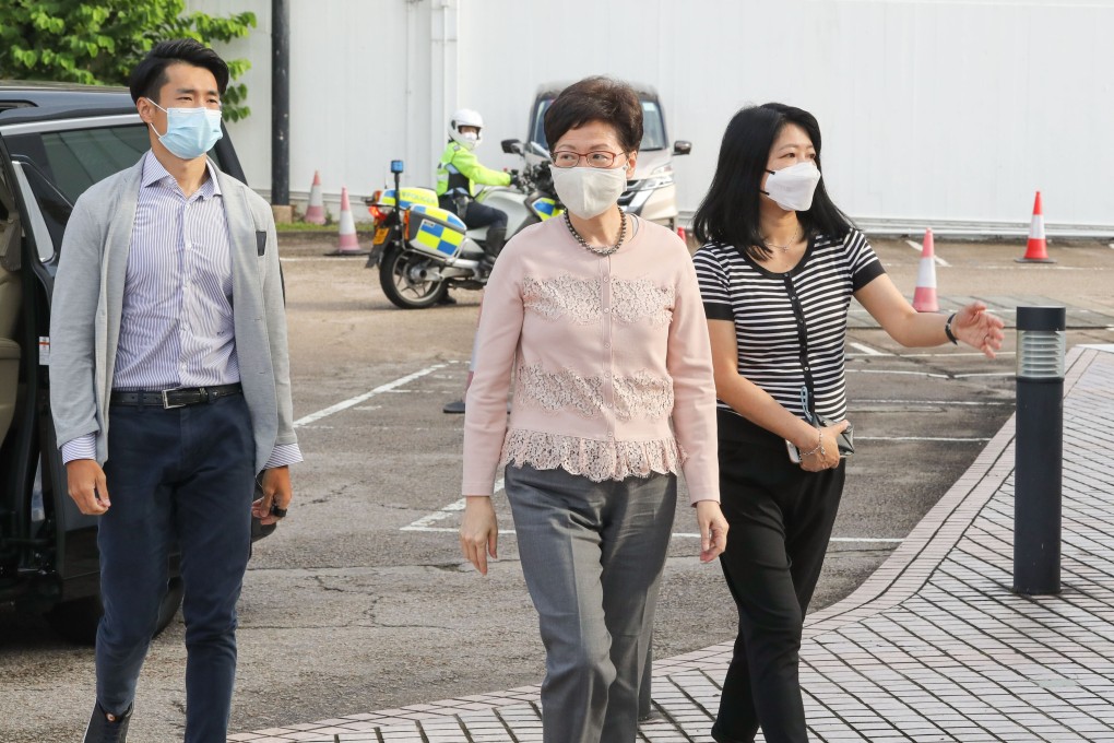 Chief Executive Carrie Lam (centre) arrives at RTHK on Saturday to appear on a radio show. Photo: Edmond So