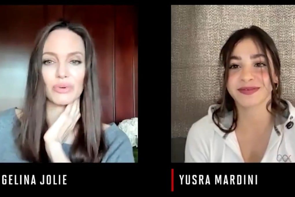 Hollywood star Angelina Jolie chats with Olympic refugee swimmer Yusra Mardini, from Syria, about her struggles. Photo: Time 100