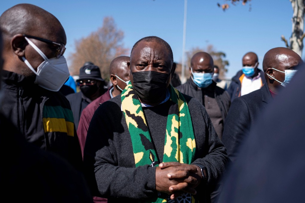 South African President Cyril Ramaphosa, centre, visits the Maponya mall on Sunday to discuss the damage caused by recent looting and destruction in Soweto. Photo: AFP