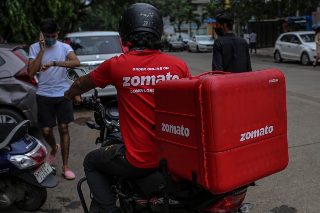 A Zomato delivery rider on a motorcycle in Mumbai, India, on July 16. Zomato became India’s first unicorn to list on a stock market with a US$1.3 billion initial public offering. Photo: Bloomberg