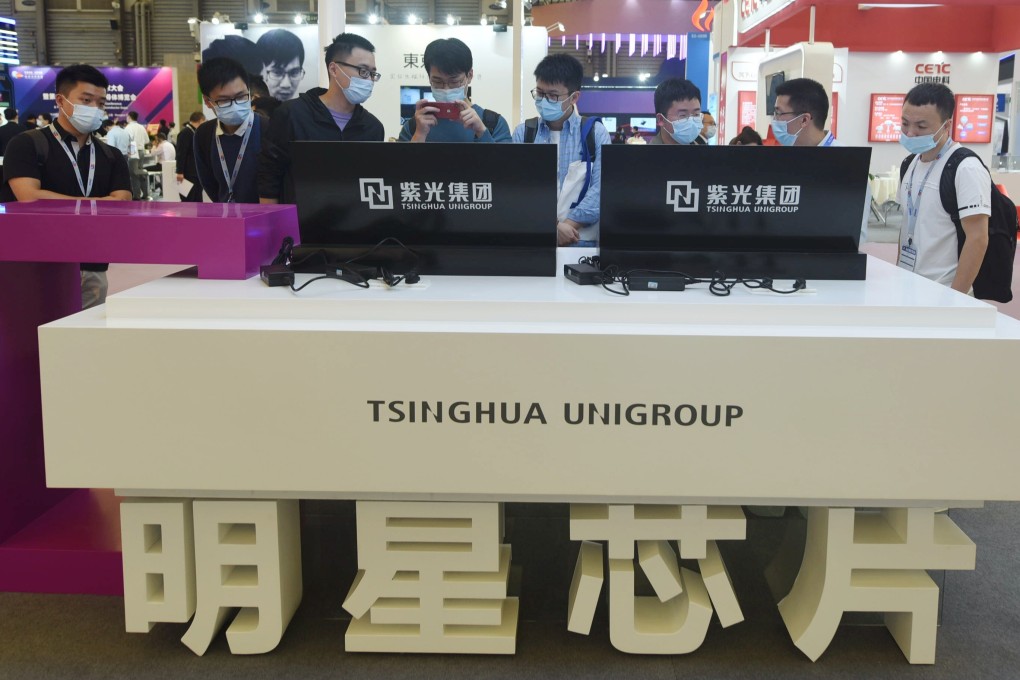 Visitors check out chip maker Tsinghua Unigroup’s stand during the China International Semiconductor Expo held in Shanghai on October 14, 2020. Photo: VCG via Getty Images