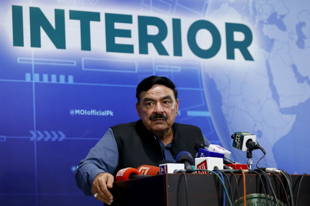 Pakistan’s Interior Minister Sheikh Rashid Ahmad speaks to the press in Islamabad, Pakistan on Sunday. Photo: AP