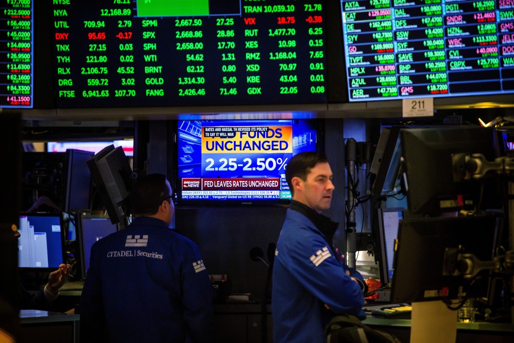 Stocks in Hong Kong and Asia-Pacific markets slip after a global sell-off as a resurgence in Covid-19 cases dims growth prospects. Photo: Bloomberg