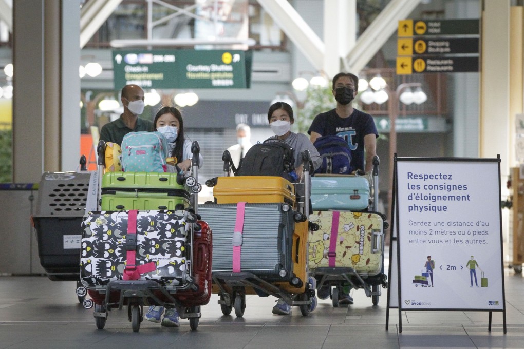 Travellers at Vancouver International Airport in Richmond, British Columbia, Canada, on July 5. Photo: Xinhua