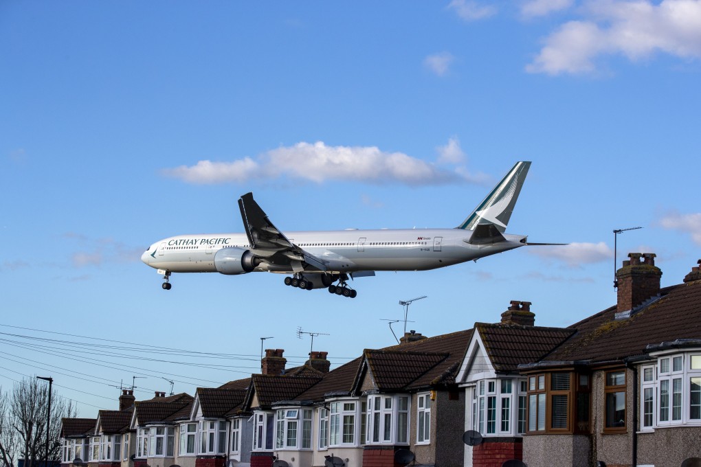 A Cathay plane approaches Heathrow Airport in West London. Photo: Getty images