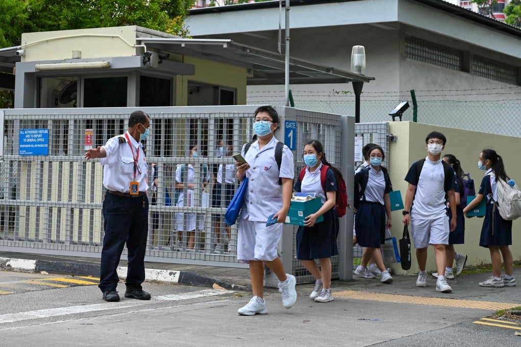 Students leave the River Valley High School on Monday after a 13-year-old boy was found dead on the campus. Photo: AFP