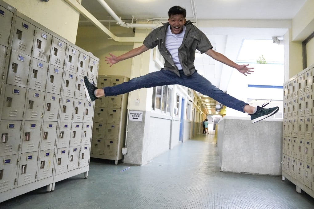 Ian Chiu, one of three ‘super achievers’ on this year’s university entrance exams, celebrates his achievement at his school in Tuen Mun on Wednesday. Photo: Sam Tsang