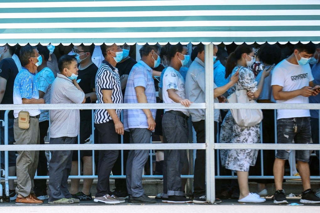 Nanjing residents queue to take coronavirus tests on Wednesday. Photo: AFP
