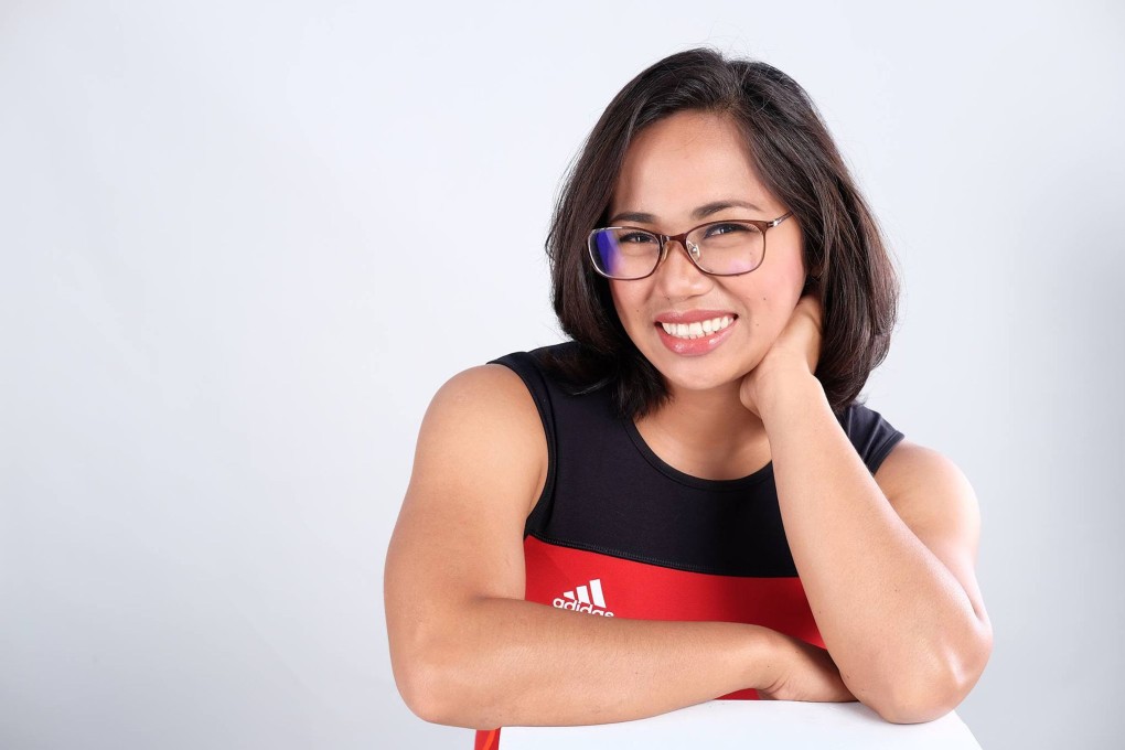 Asian athletes such as Filipino weightlifter Hidilyn Diaz are going for gold at the Tokyo Olympics. Photo: SCMP Pictures