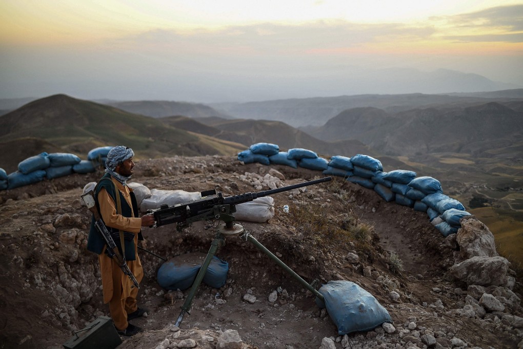An Afghan militia fighter keeps a watch at an outpost against Taliban insurgents. China has said it wants to make contact with “all sides” in the conflict. Photo: AFP