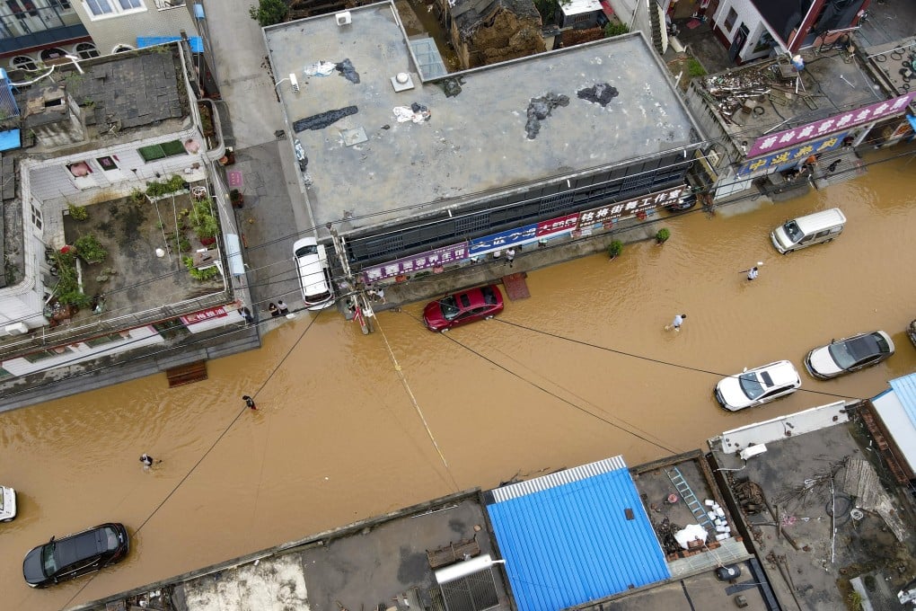 A flooded street in Xinjiang city, in central China's Henan province, on July 22. Photo: Simon Song