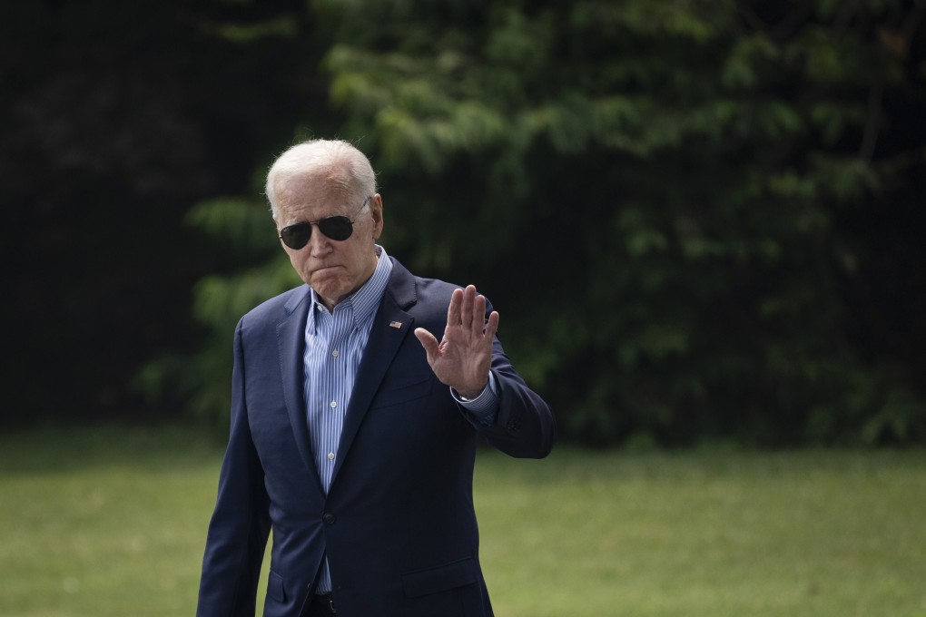 US President Joe Biden waves shortly before leaving Washington on Wednesday to travel to Ohio for a town hall event in which he discussed democracies and autocracies. Photo: Getty Images/TNS