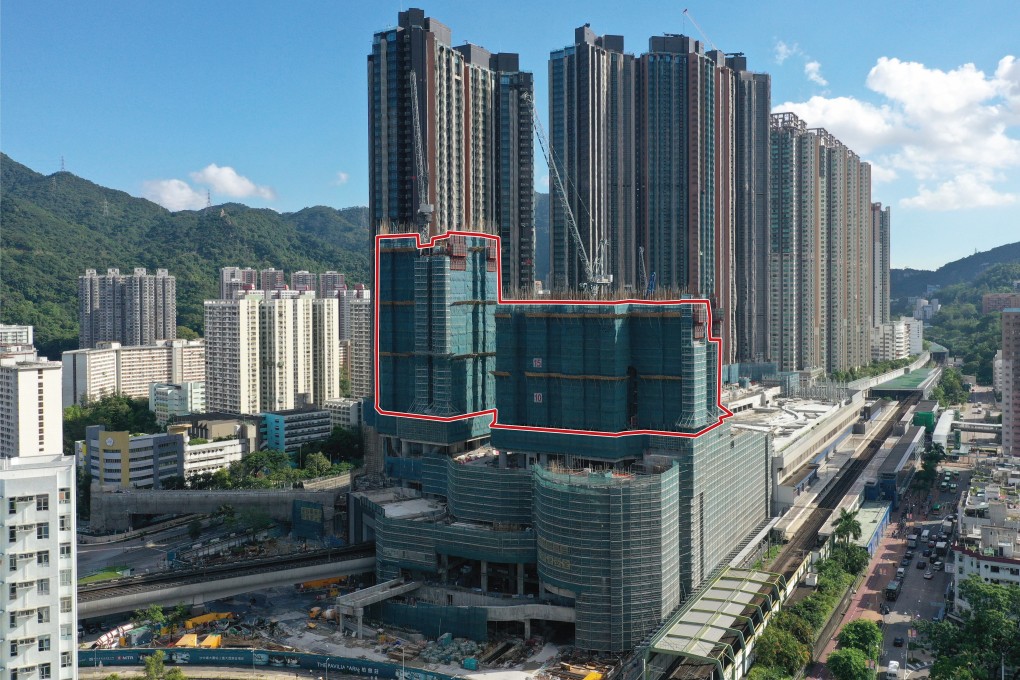 The Pavilia Farm III project, standing atop the MTR subway station in Tai Wai, will be partially demolished because of a construction defect. The affected towers, blocks 1 and 8, outlined in red, are under construction. Photo: Sam Tsang
