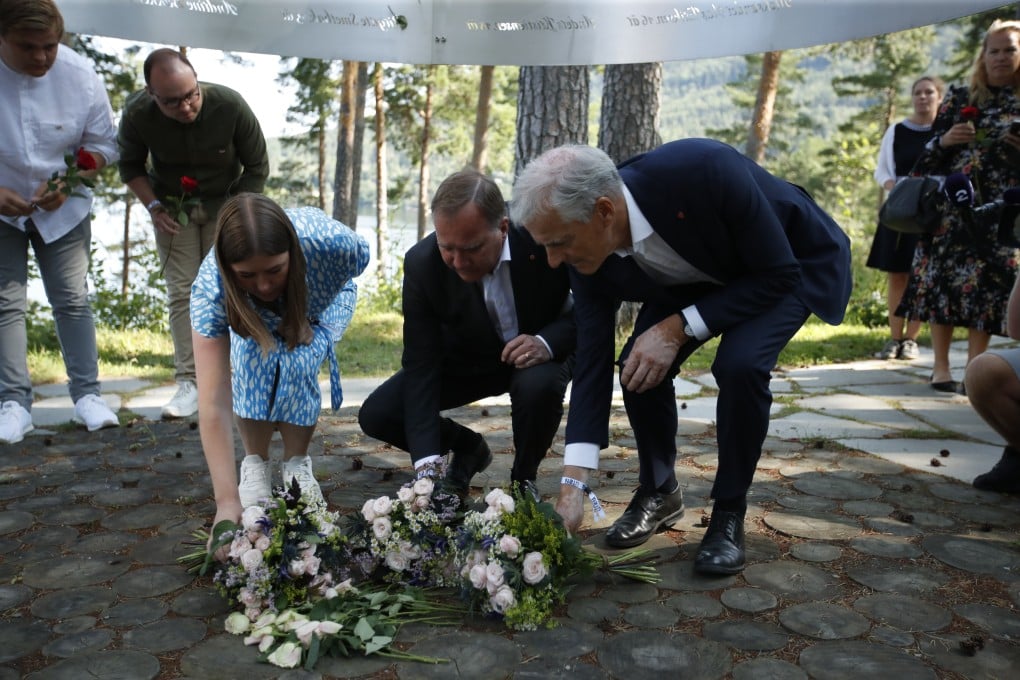 Officials including Stefan Lofven, Sweden’s prime minister, and Jonas Gahr Store, leader of the Norwegian Labour Party, lay flowers at the Utoya memorial earlier this week. Photo: NTB/DPA