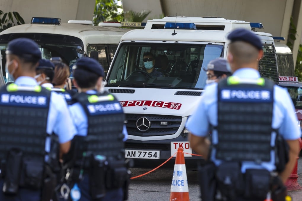 Former Apple Daily associate publisher Chan Pui-man arrives at West Kowloon Court in a police van on Thursday. Photo: Dickson Lee