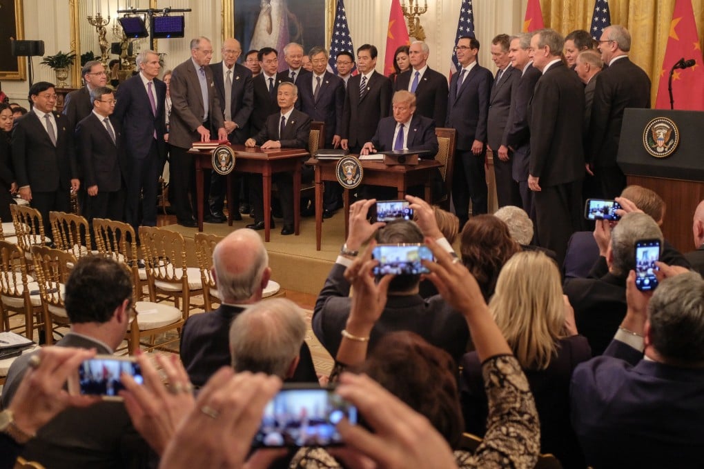 Then-US president Donald Trump and Chinese Vice-Premier Liu He signed the phase-one trade deal in January 2020. Photo: EPA-EFE