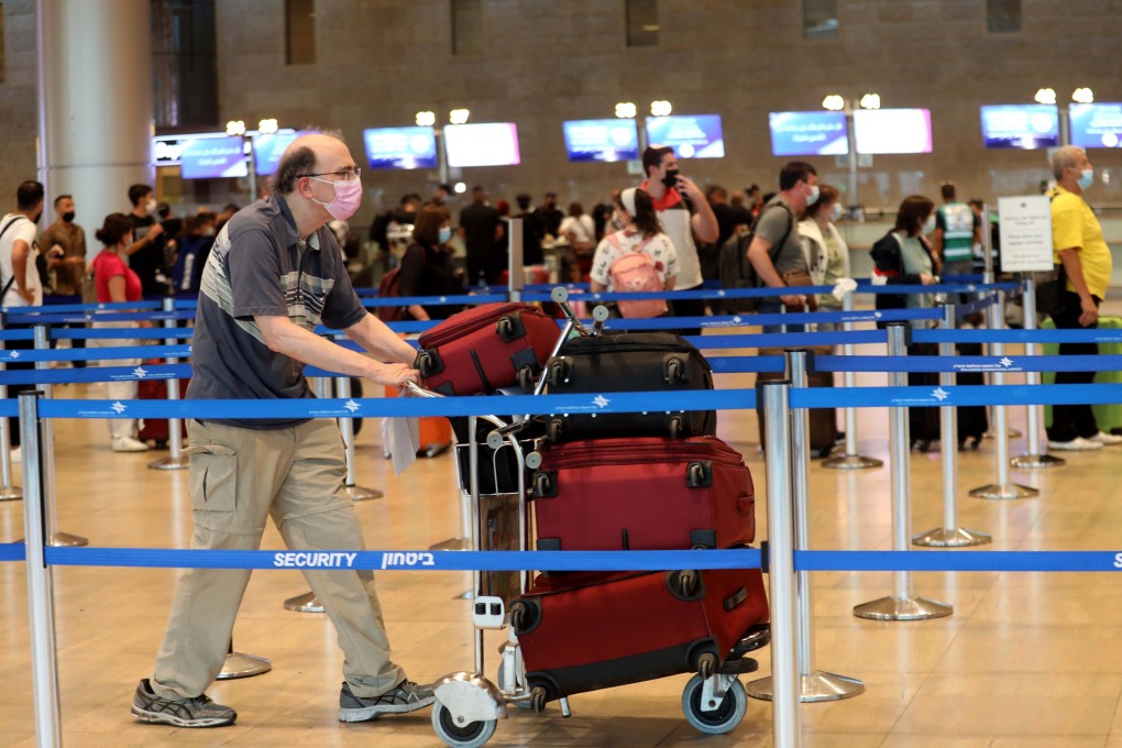Passengers wearing face masks are seen in the departure hall at Ben Gurion International Airport near Tel Aviv, Israel. Photo: Xinhua