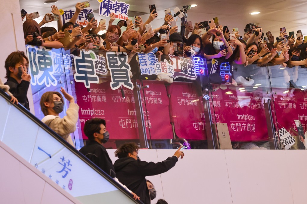 Rapturous cheers greet members of the boy bands Mirror and Error at a New Territories shopping centre. Photo: Dickson Lee