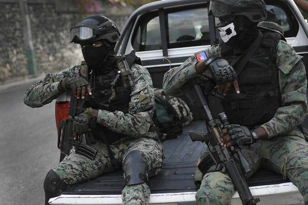 Soldiers stand guard in Port-au-Prince, Haiti, on July 11. Photo: AP