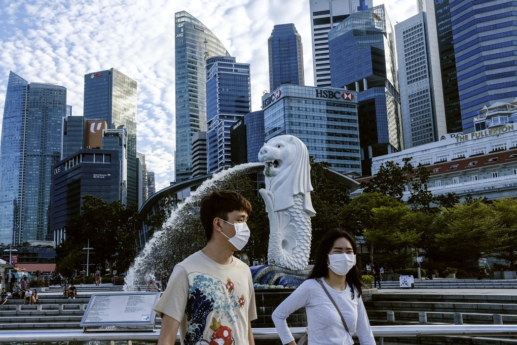 Singapore’s plan to embrace a new normal regarding its Covid-19 policies has been challenged by a recent surge in new cases. Photo: AP