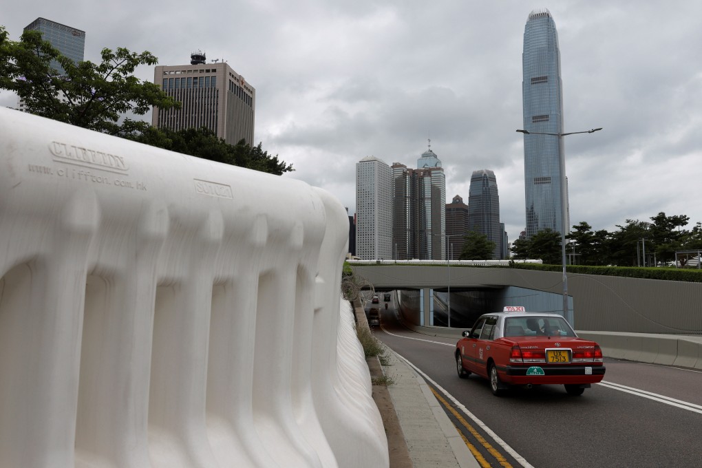 Water-filled barriers are seen in the Hong Kong central business district. A report warned years of border closures would drive economies toward self-sufficiency and could have negative effects. Photo: Reuters