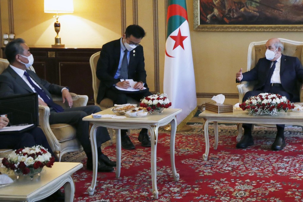 Algerian President Abdelmadjid Tebboune (right) meets visiting Chinese State Councillor and Foreign Minister Wang Yi (left) in Algiers, Algeria, on Monday. Photo: Xinhua