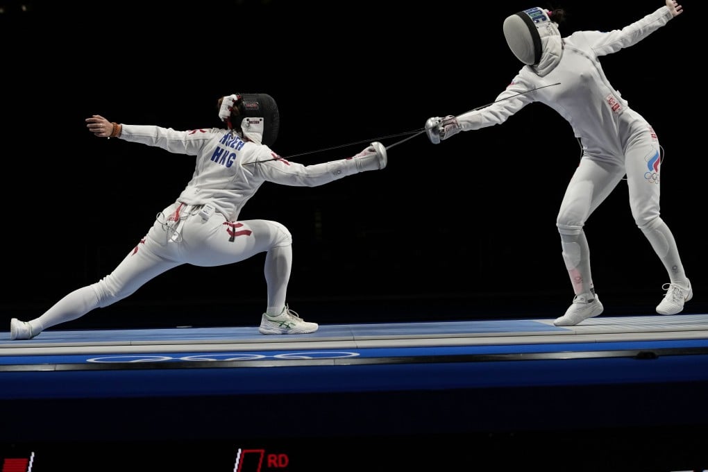 Hong Kong’s Kaylin Hsieh (left) was eliminated in the first round of the individual épée by Aizanat Murtazaeva of the Russian Olympic Committee. Photo: AP
