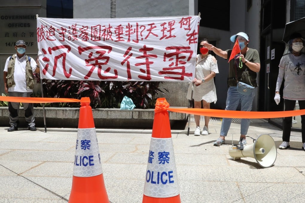 Protesters show their support to seven defendants of the Yuen Long attack outside the District Court in July 2019. Photo: SCMP