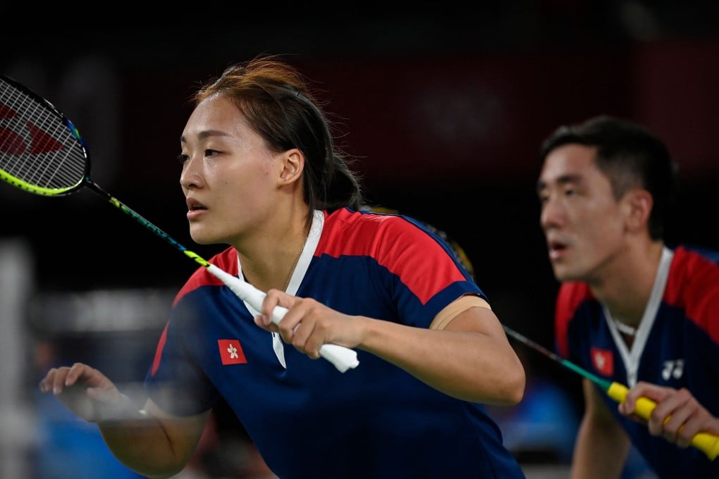 Hong Kong's Tang Chun-man (right) and Tse Ying-suet prepare for a point in their mixed doubles badminton group stage match against China's Huang Dongping and Wang Yilyu during the Tokyo Olympic Games on Sunday. Photo: AFP