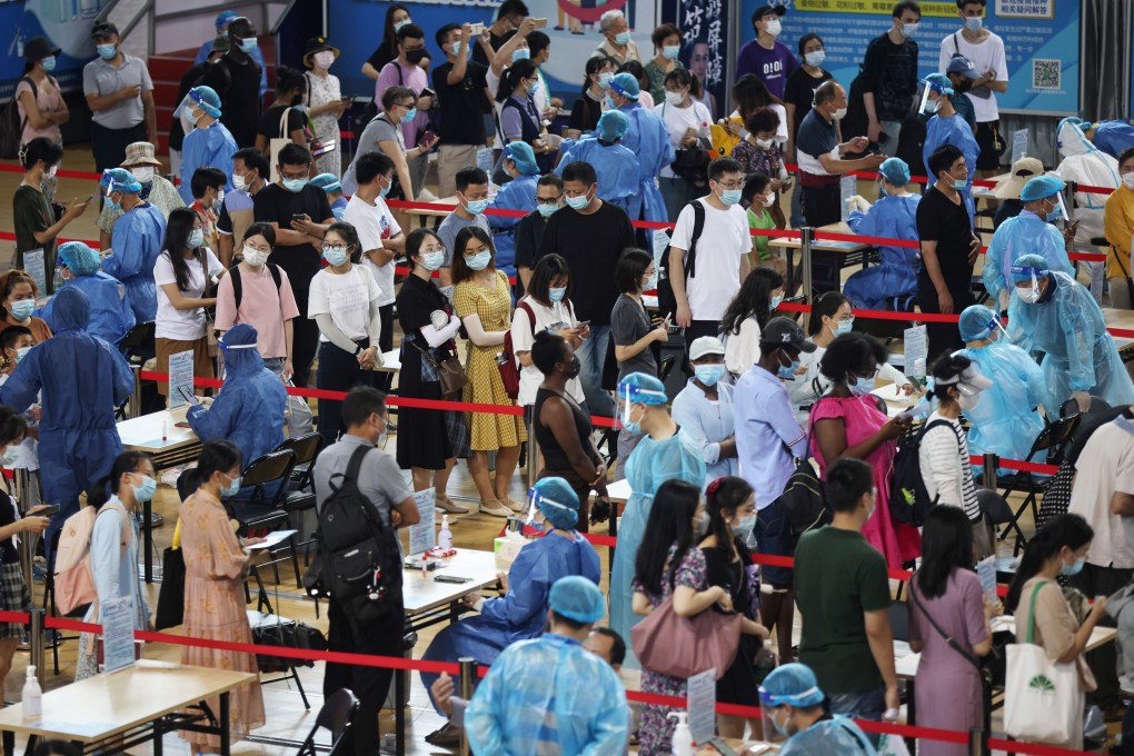Nanjing residents line up for coronavirus tests on Thursday to try to contain a cluster. Photo: Reuters
