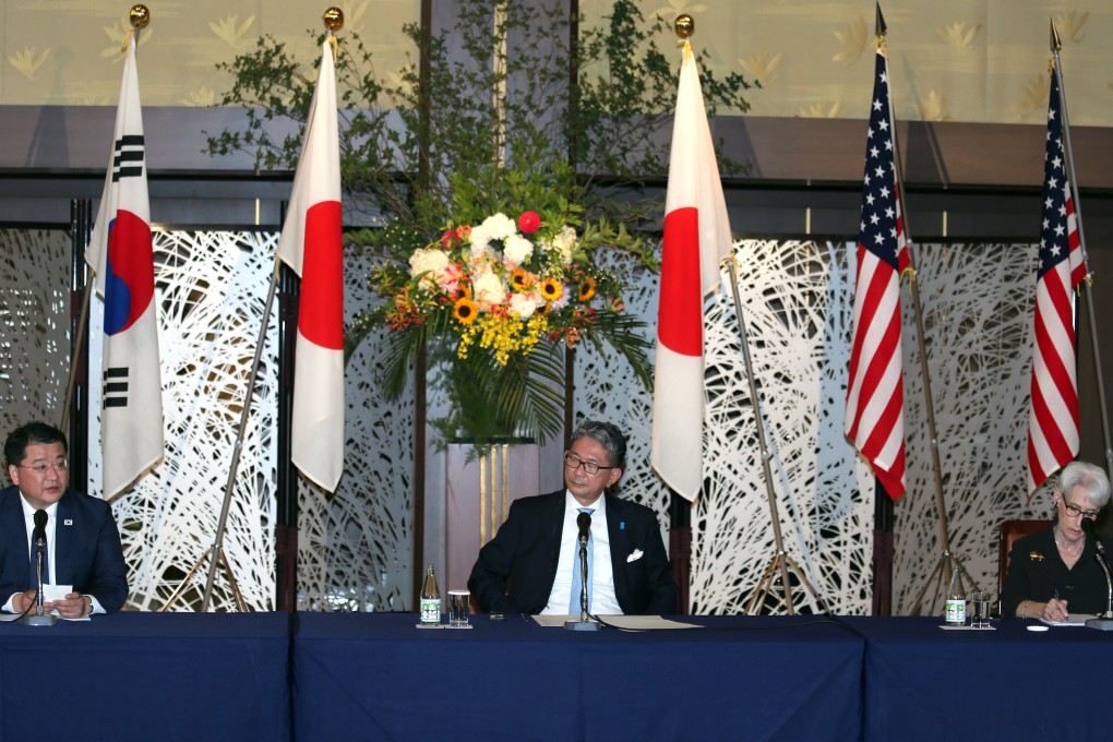 South Korea's First Vice-Foreign Minister Choi Jong-kun, Japanese Vice-Foreign Minister Takeo Mori and US Deputy Secretary of State Wendy Sherman attend a joint media briefing after trilateral talks in Tokyo. Photo: EPA-EFE
