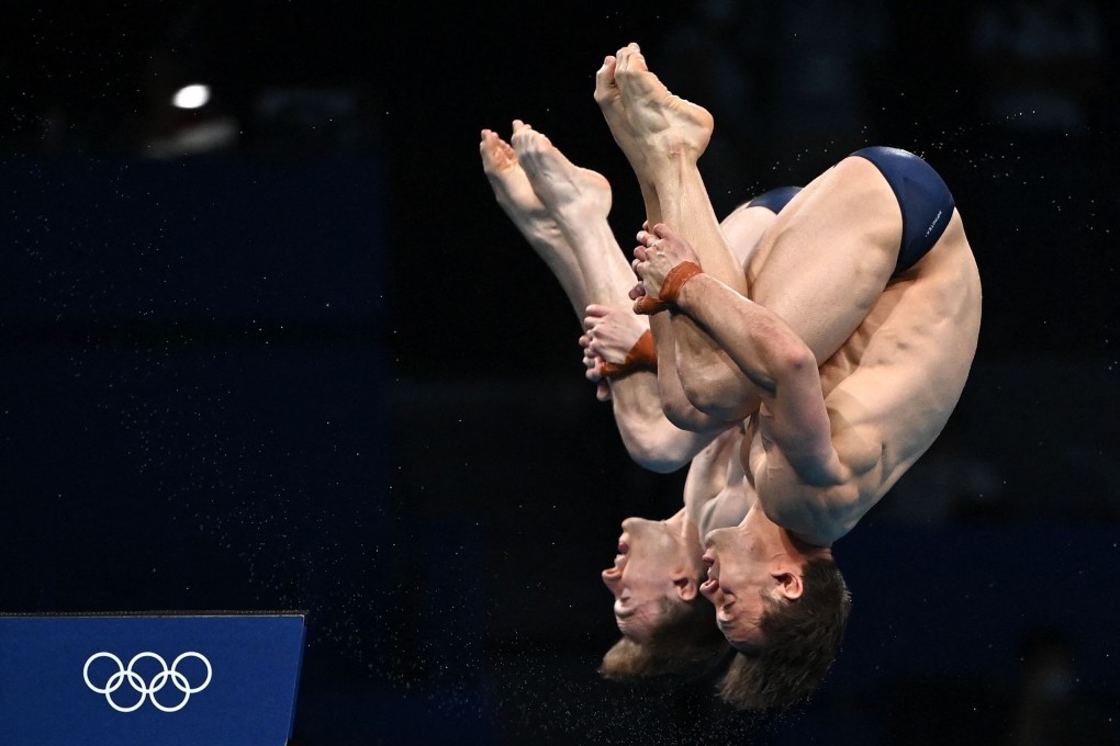Britain’s Tom Daley and Matty Lee on their way to gold in the men’s synchronised 10m platform diving final event at the Tokyo 2020 Olympic Games. Photo: AFP