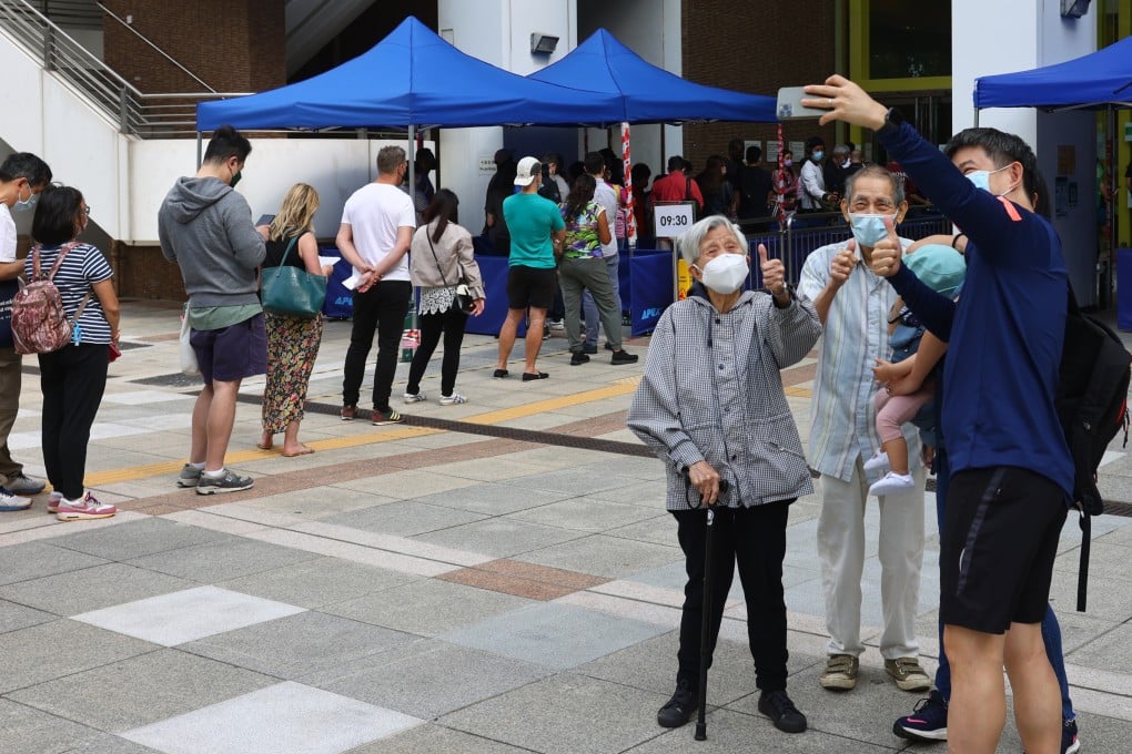 Elderly Hong Kong residents offer a thumbs up after receiving their BioNTech jabs in April. Photo: Nora Tam