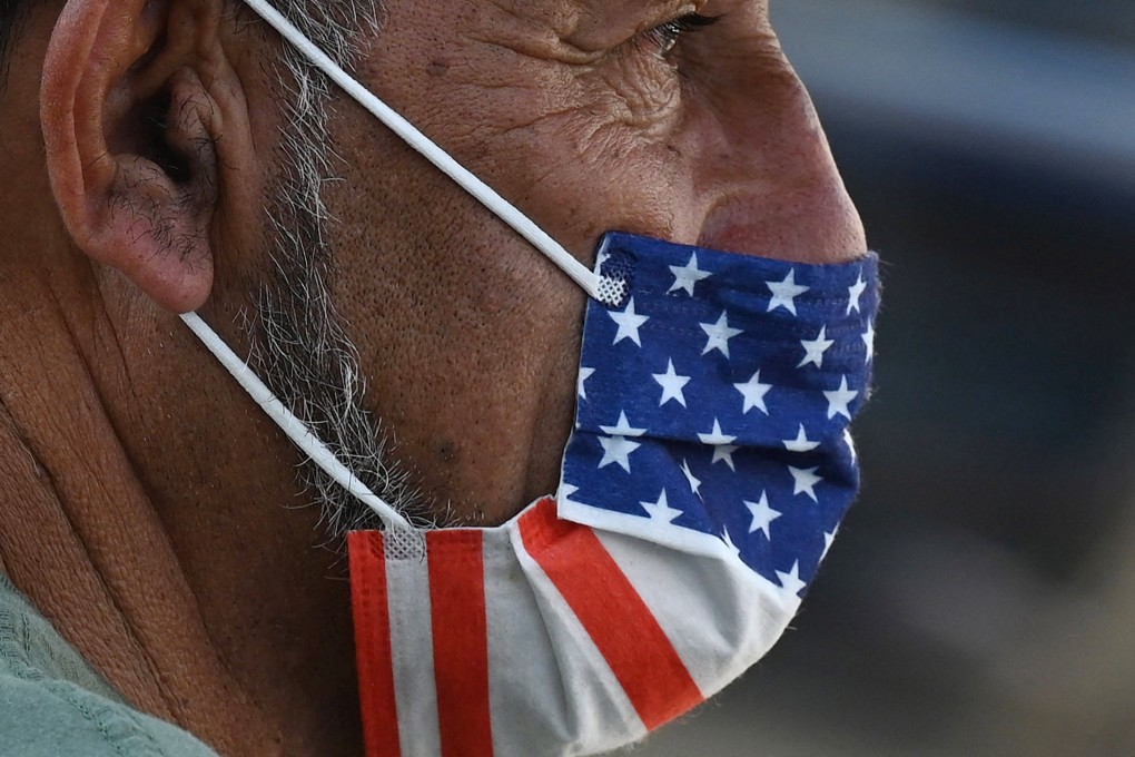 A man wears an American flag face mask in Hollywood, California. Photo: AFP