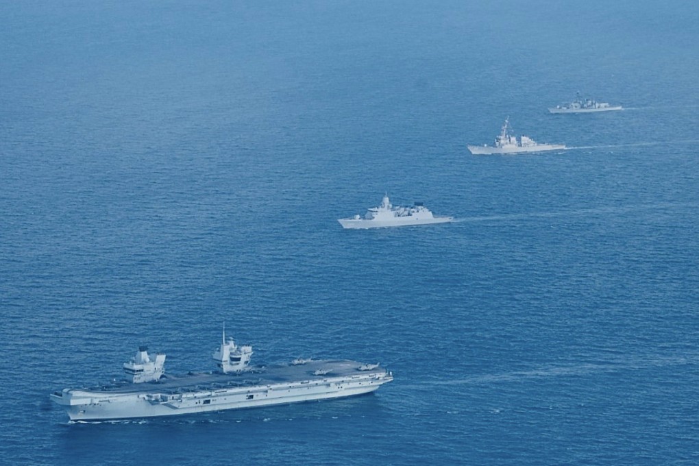 HMS Queen Elizabeth (left) and other ships in the South China Sea region on July 26. Photo: Handout