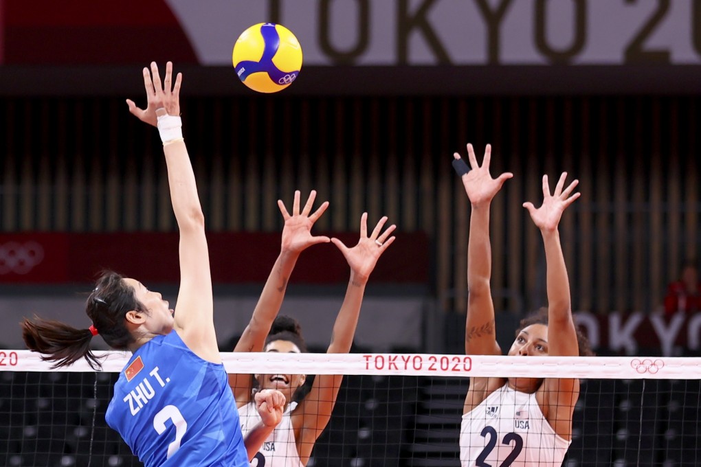 China’s Zhu Ting (left) spikes during the women's volleyball preliminary round match between China and the United States at the Tokyo 2020 Olympic Games. Photo: Xinhua