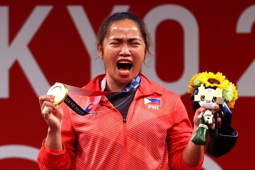Gold medallist Hidilyn Diaz, of the Philippines, celebrates her Tokyo 2020 Olympics triumph. Photo: Reuters