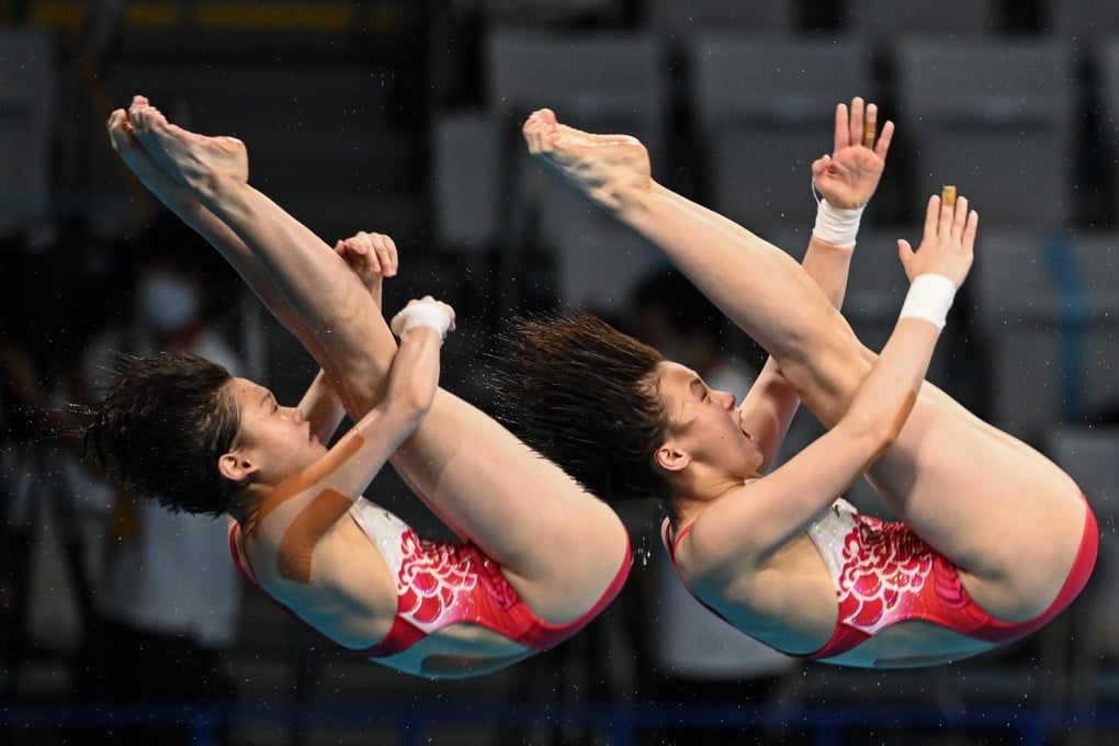 Chen Yuxi and Zhang Jiaqi of China compete during the women’s synchronised 10m platform final at Tokyo 2020 Olympics. Photo: Xinhua