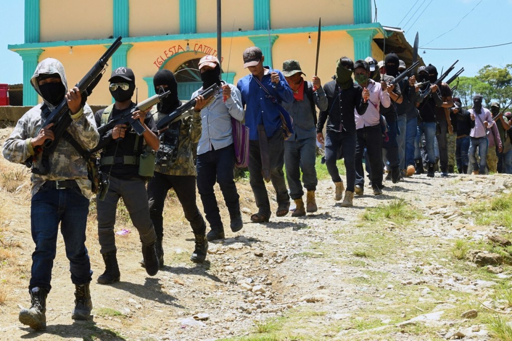 Members of the new self-defence group called “El Machete” that intends to combat criminal groups in the San Jose Tercero indigenous Tzotzil community are seen in Chiapas State, Mexico, on July 18. Photo: AFP