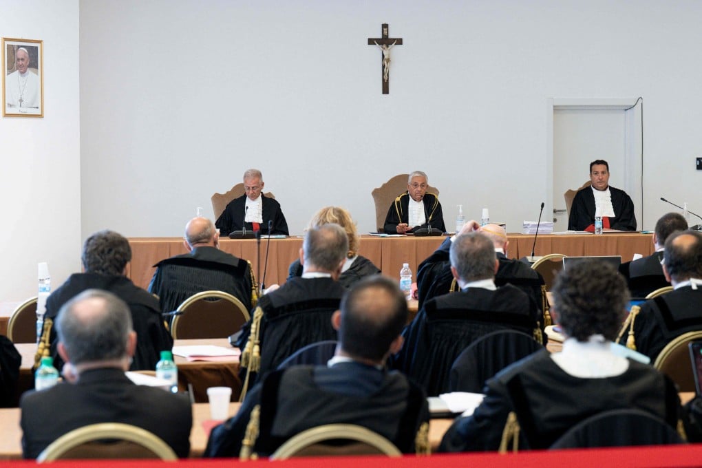 Professor Venerando Marano (left), Chief Judge Giuseppe Pignatone (centre) and Carlo Bonzano during the trial for alleged financial wrongdoing of Cardinal Angelo Becciu and nine others in the Vatican on Tuesday. Photo: AFP